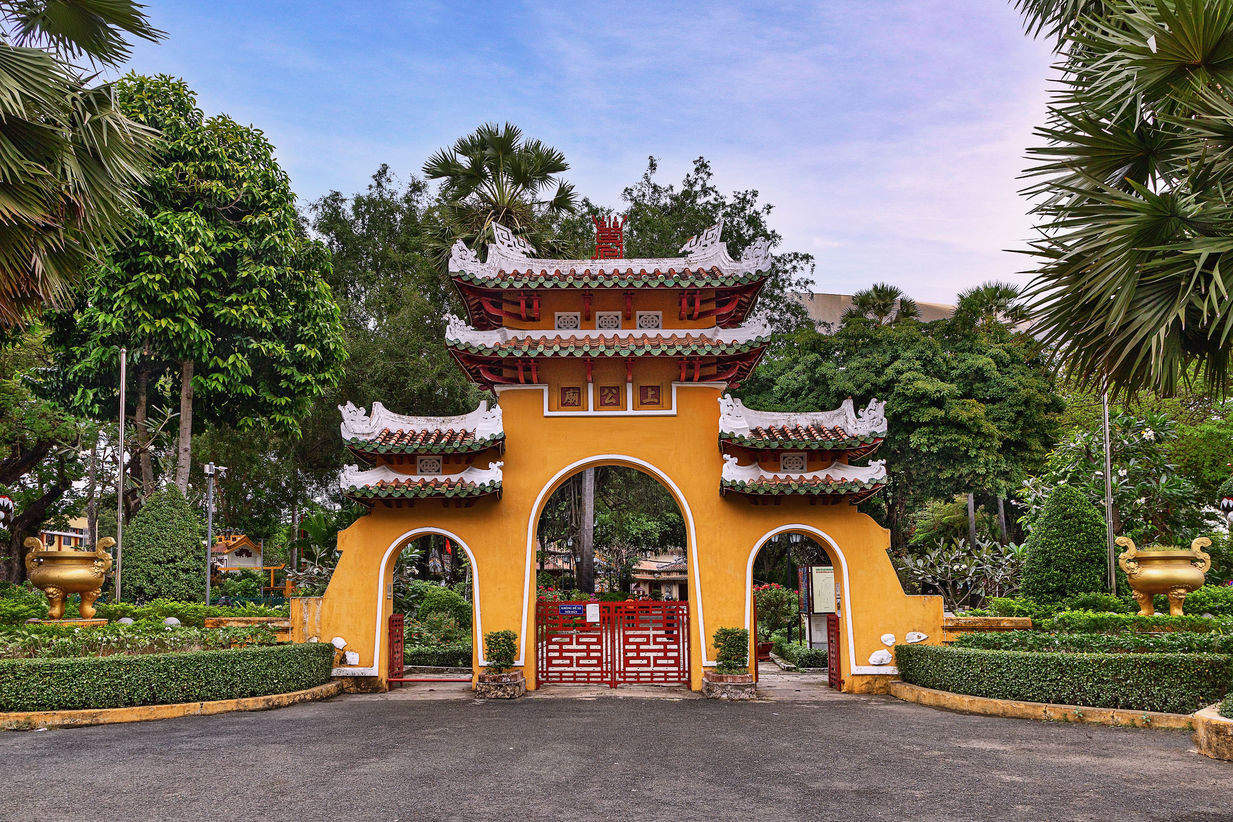 Ancient Gateway in a Lush Vietnamese Garden · Free Stock Photo