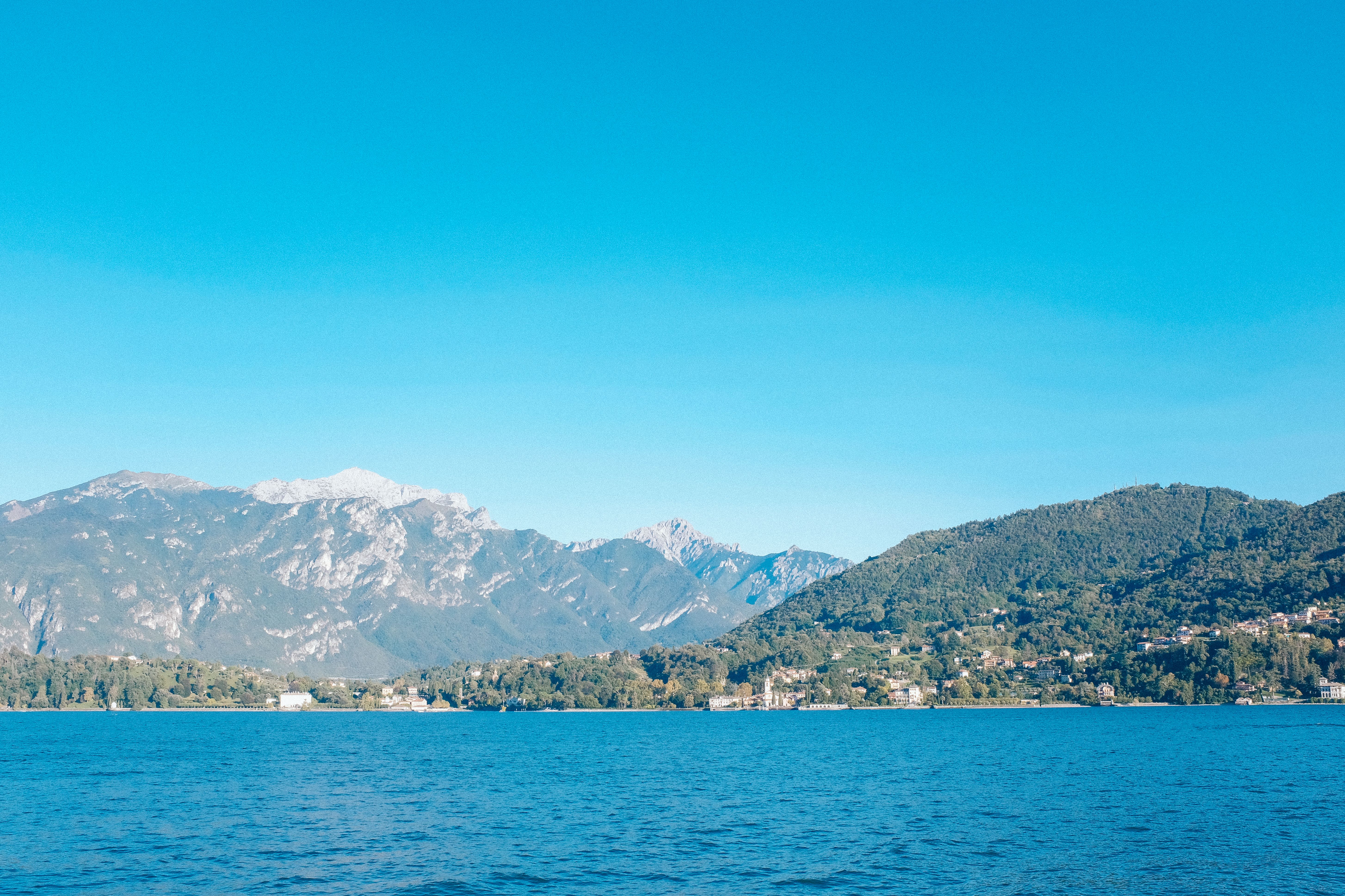 Scenic Lake View with Mountain Backdrop · Free Stock Photo