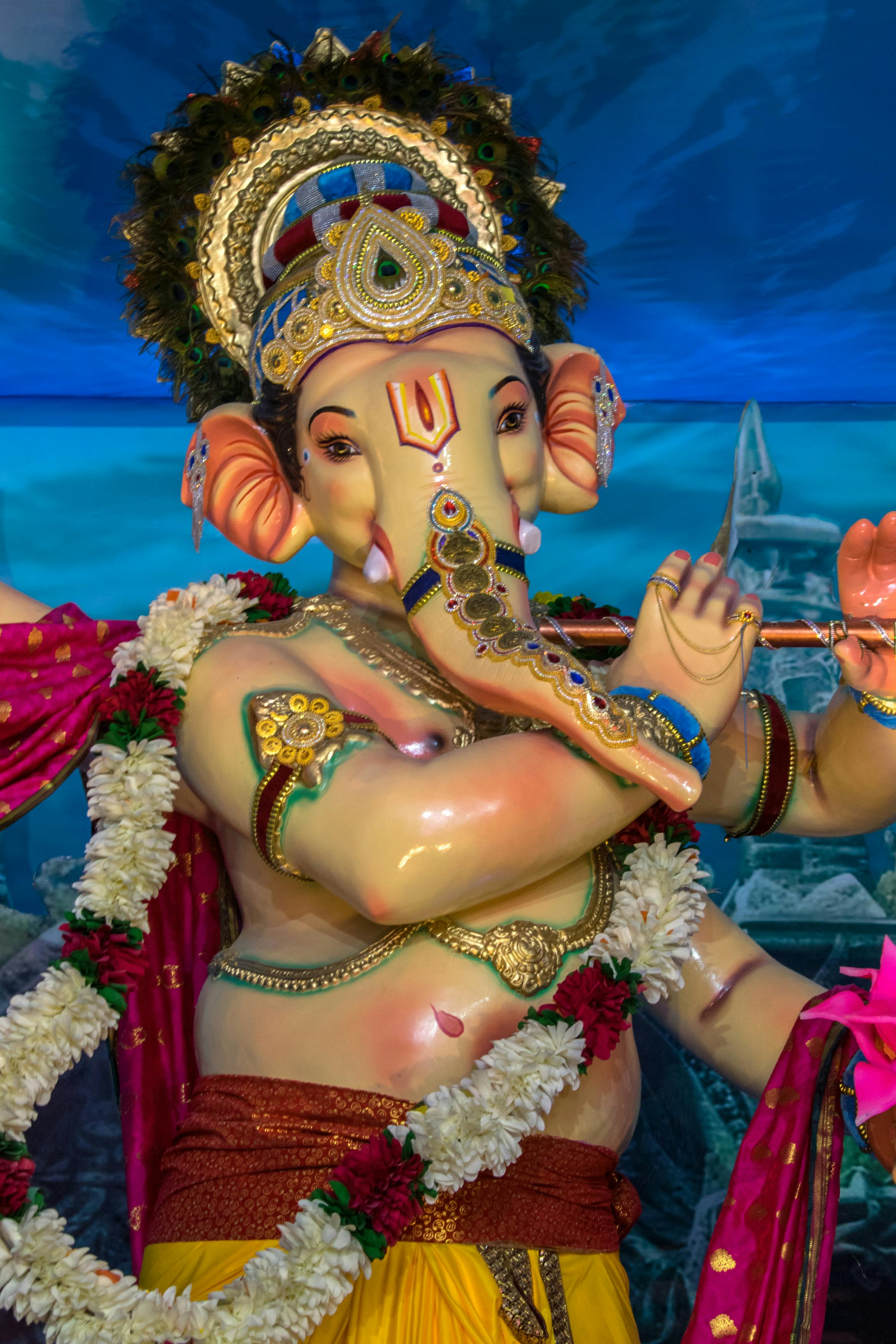 Colorful statue of Lord Ganesha during Ganesh Chaturthi festival in Mumbai.