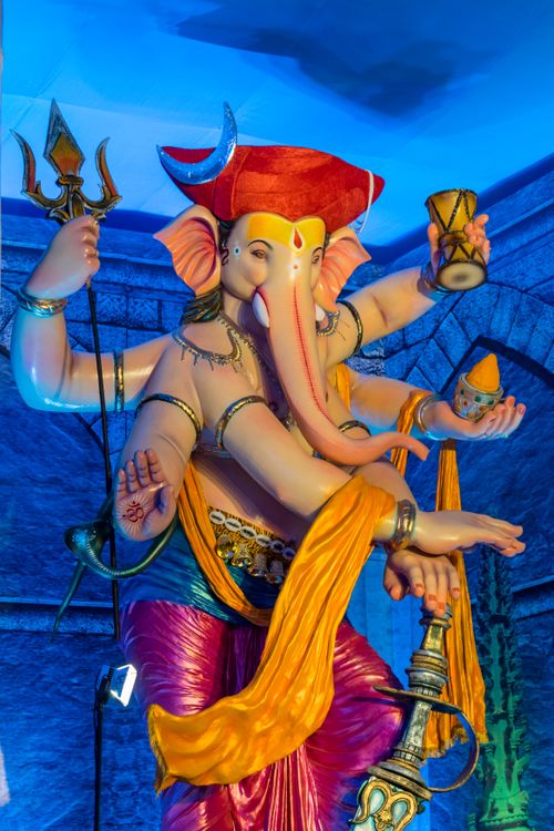 Free Colorful Ganesh statue during Ganesh Chaturthi in Mumbai, India, depicting spiritual and cultural significance. Stock Photo