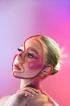 Creative portrait featuring a unique and vibrant art makeup design on a young woman.