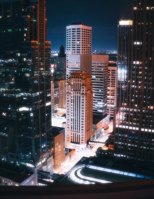 Beautiful night view of the illuminated Minneapolis skyline with modern skyscrapers.
