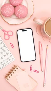 A stylish pink-themed desk setup featuring a smartphone mockup, cupcakes, and office supplies.