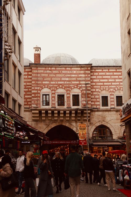 Free Busy market street in Istanbul with people shopping and historic architecture. Stock Photo