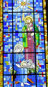 Colorful stained glass depicting the Nativity scene in a Brazilian church, offering a vivid and sacred ambiance.