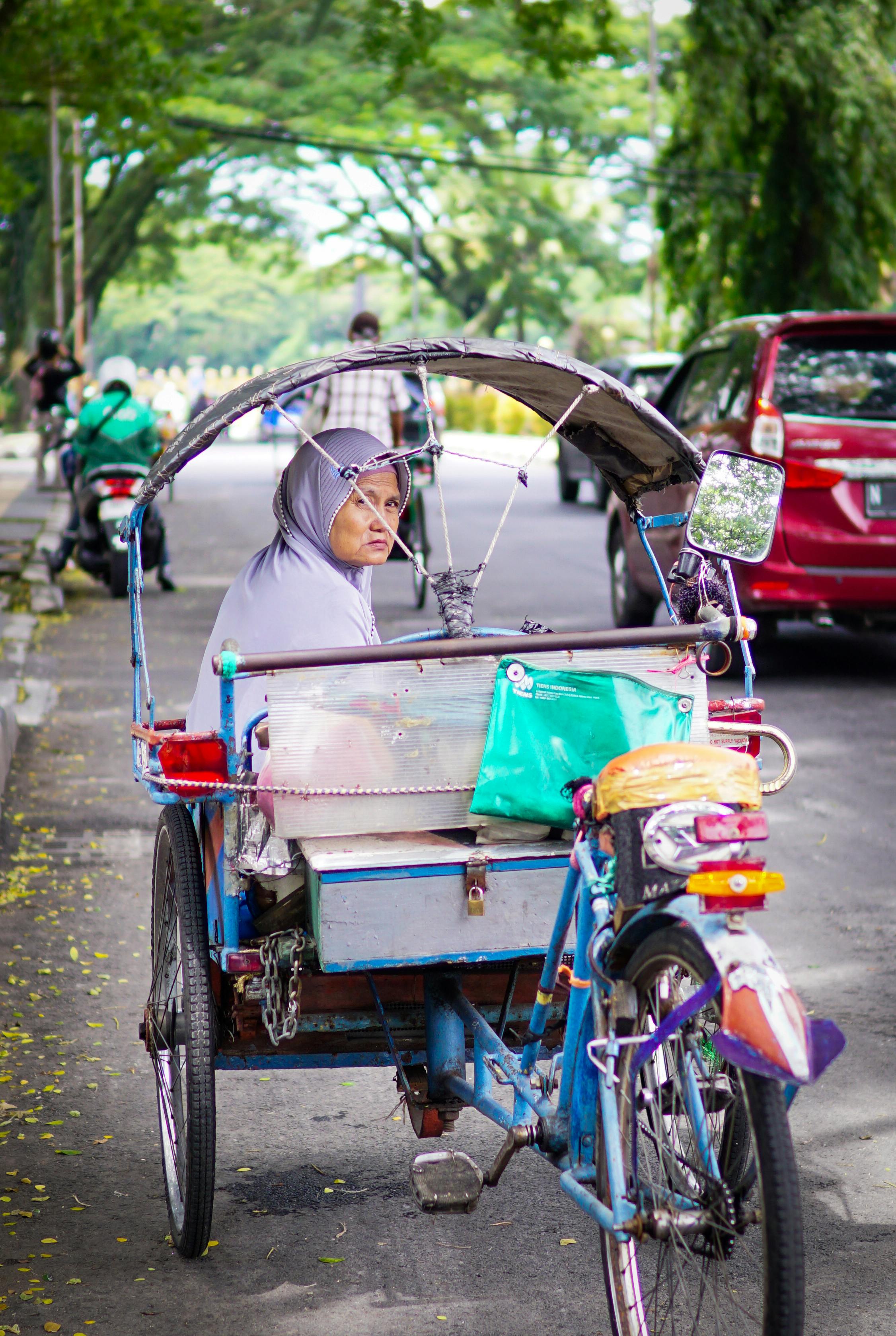 traditional becak ride in malang street