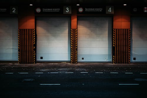 Garage gates near road in city