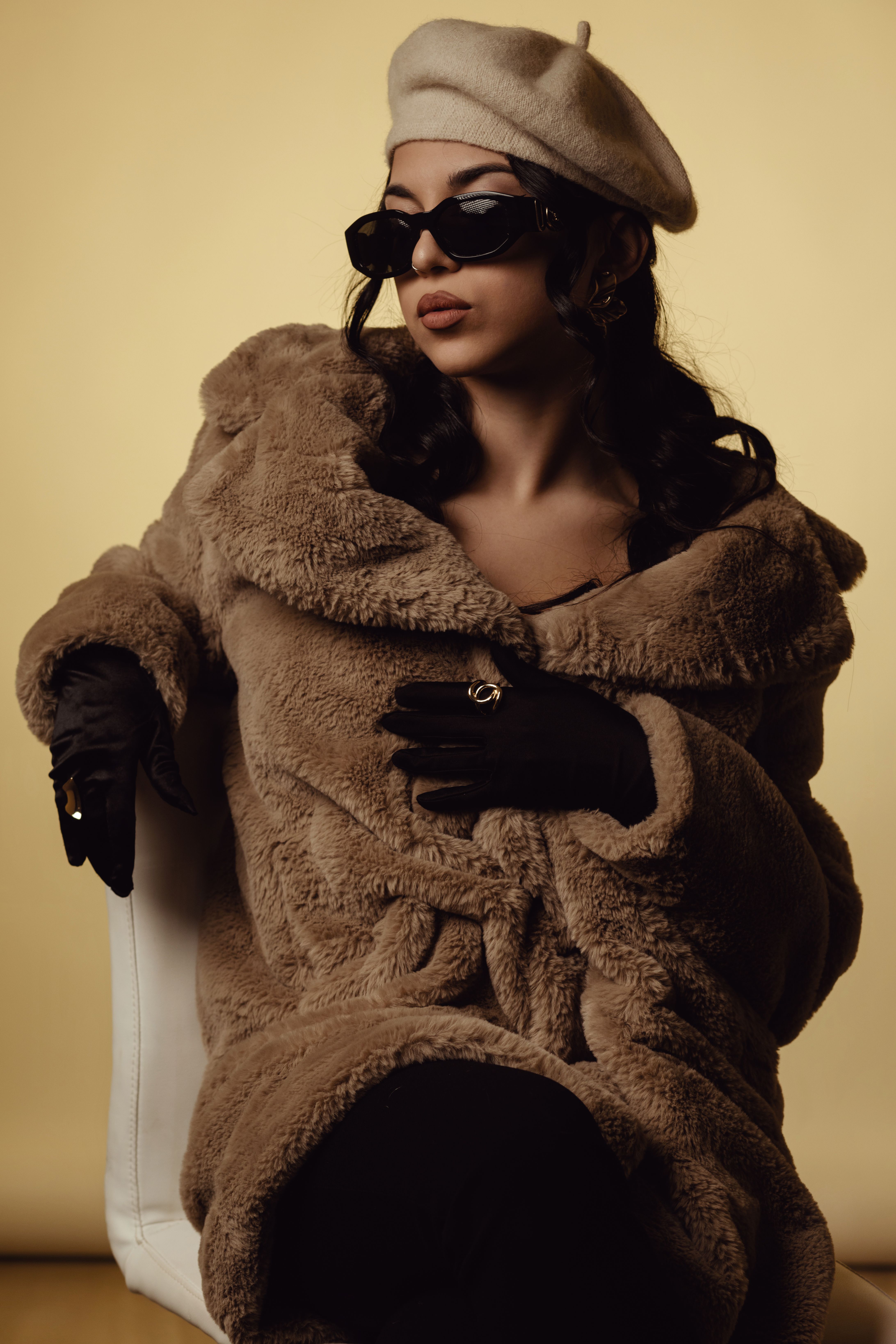 Faux fur coat over slip dress for holidays