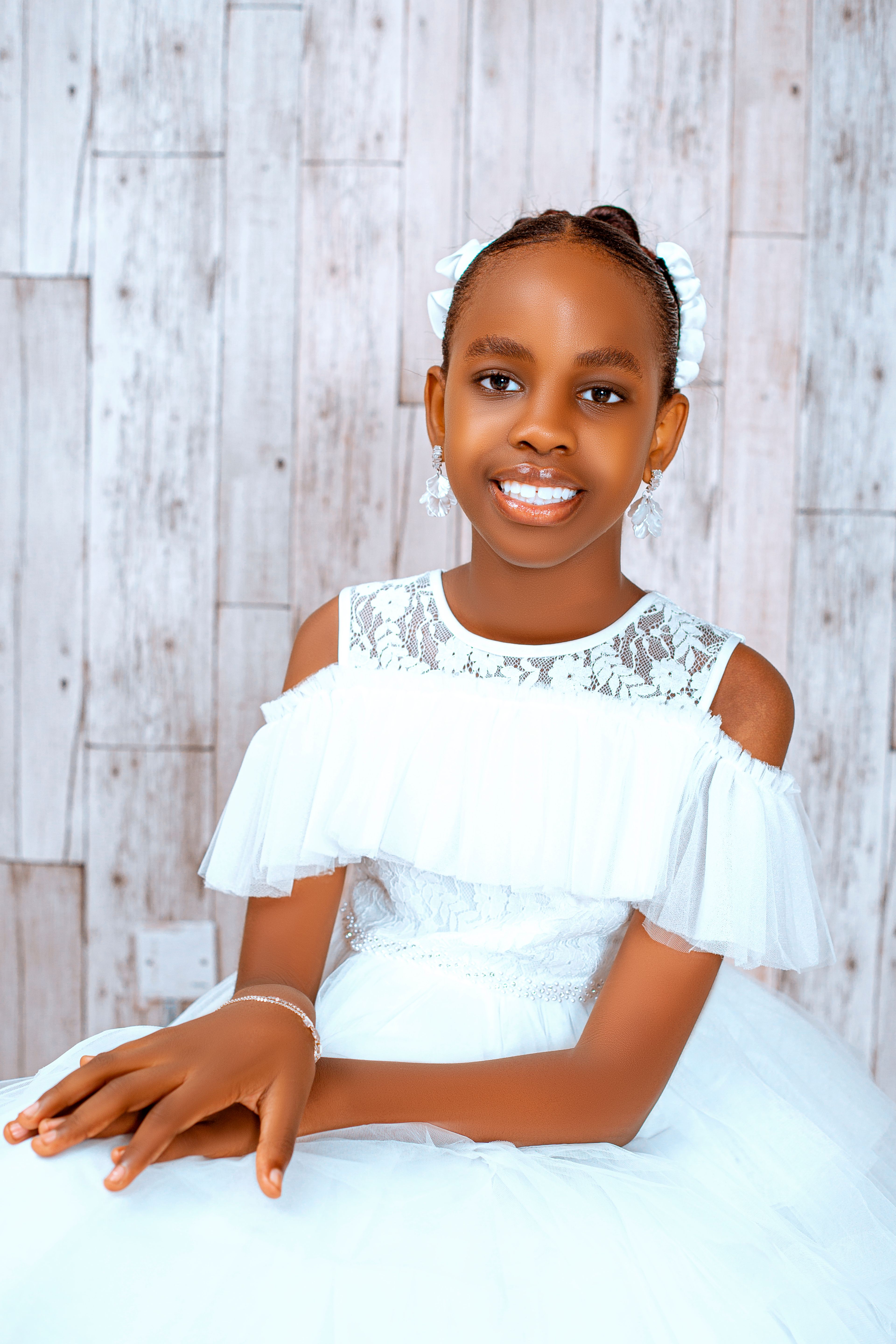 Elegant Portrait of a Young Girl in White Dress · Free Stock Photo