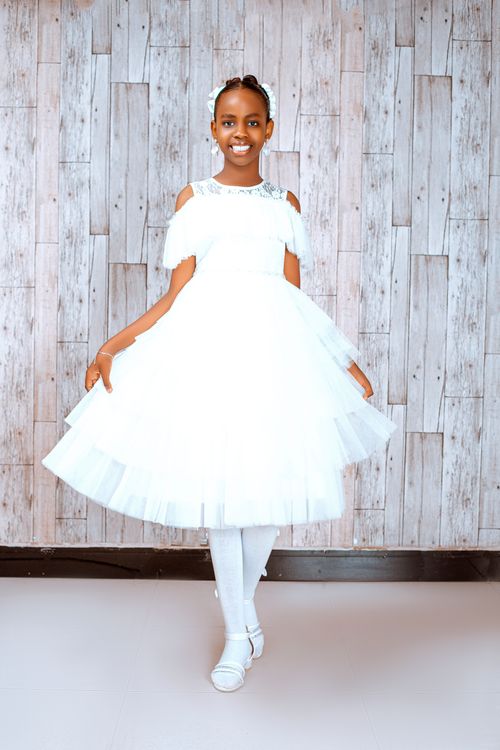 Charming Portrait of Young Girl in Elegant White Dress · Free Stock Photo