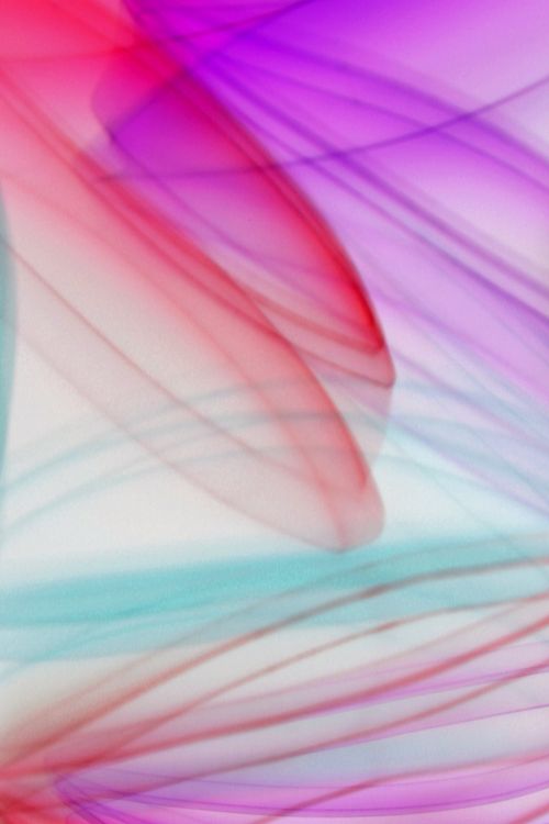 Free Vibrant abstract image of light trails in red, purple, and blue hues creating dynamic patterns. Stock Photo