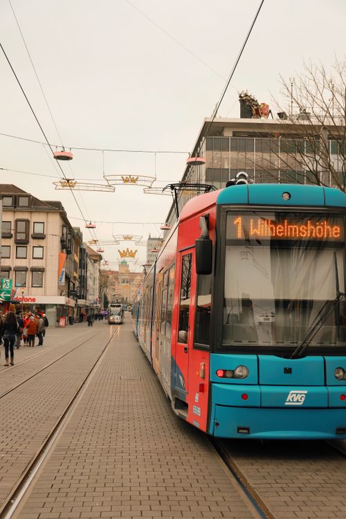 Free Tram decorated for Christmas in Kassel's downtown, Germany, capturing festive spirit. Stock Photo