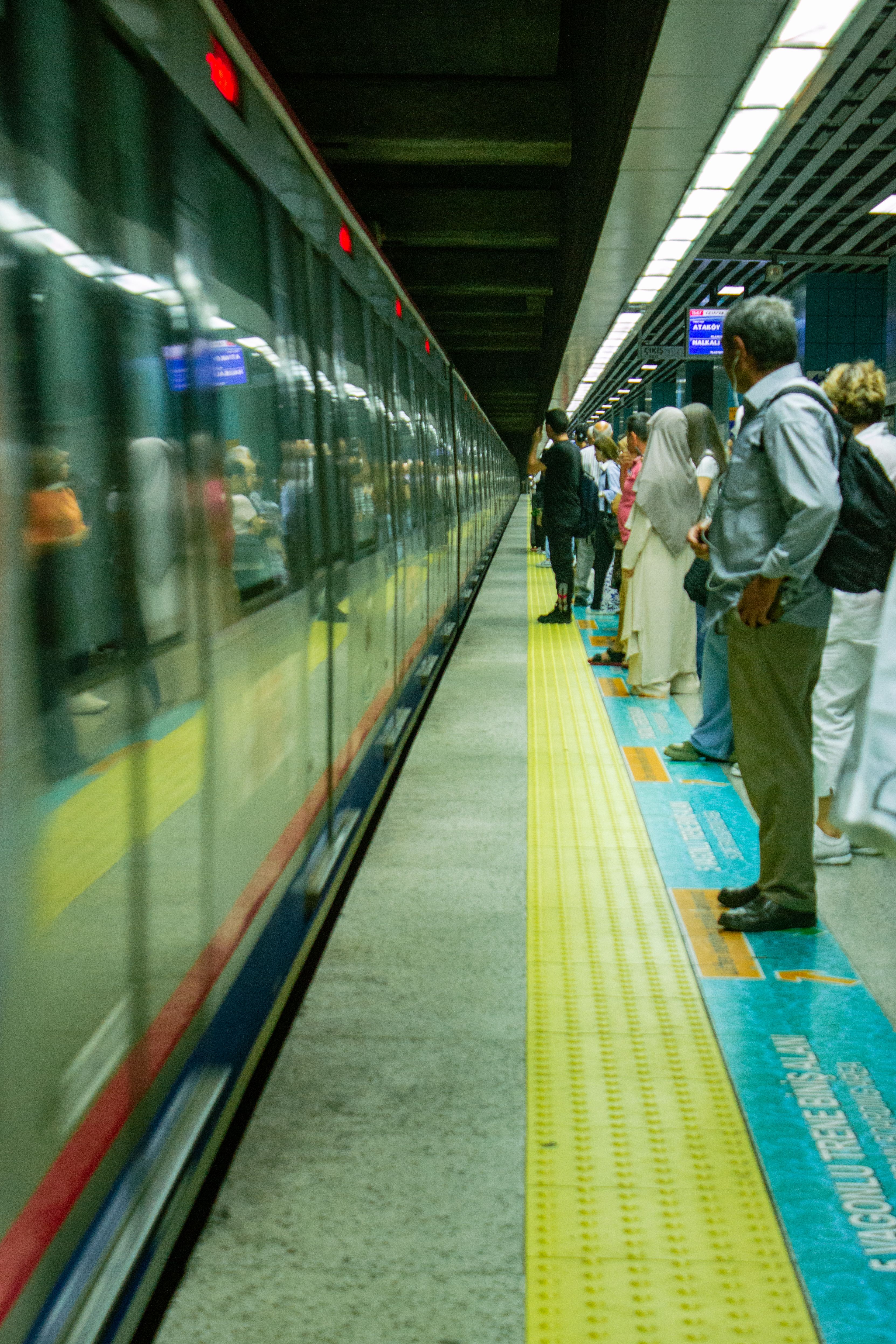 Commuters Waiting for Subway Train in Station · Free Stock Photo