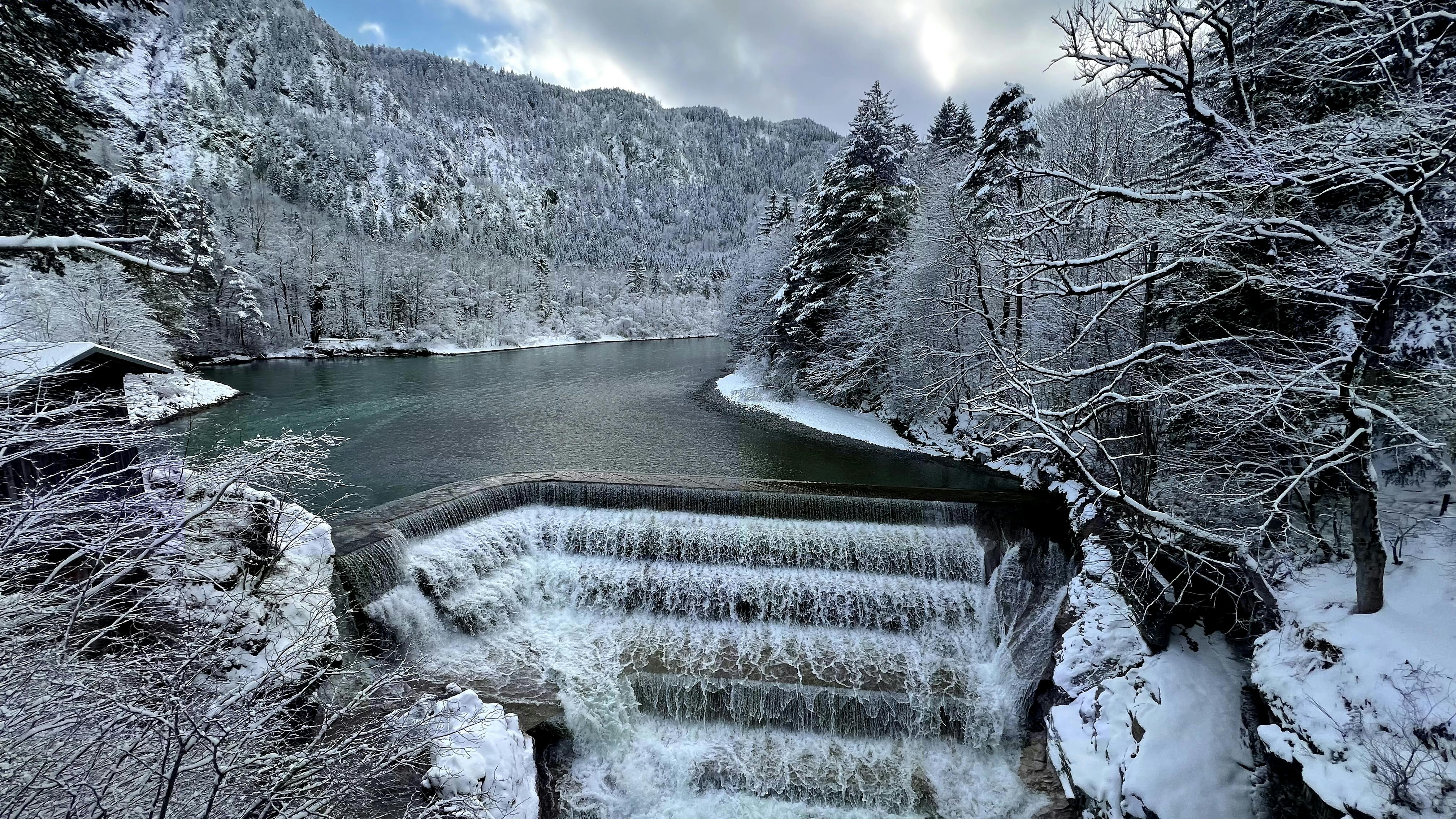 winter waterfall in bavaria s snowy landscape