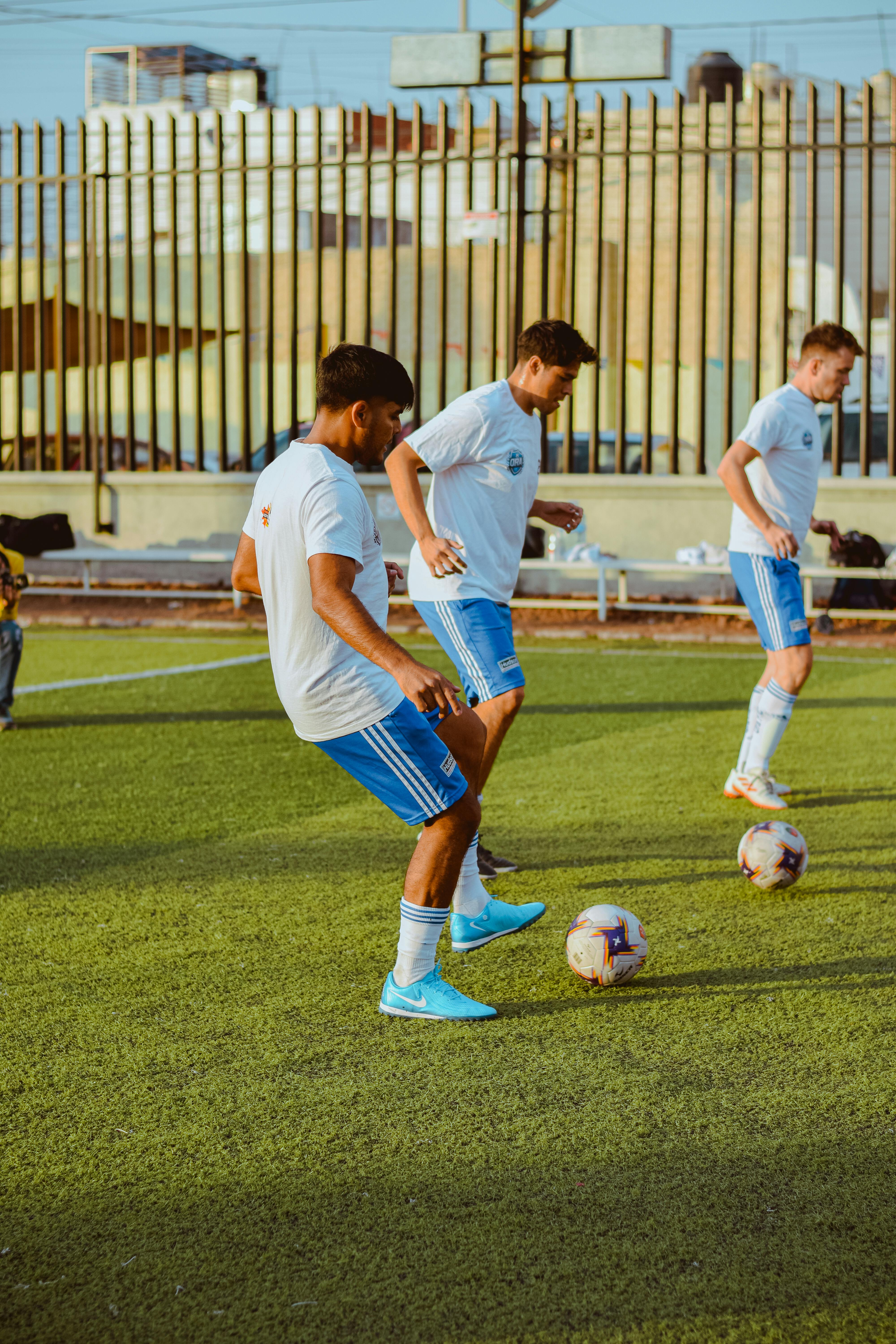 young soccer players practicing on field