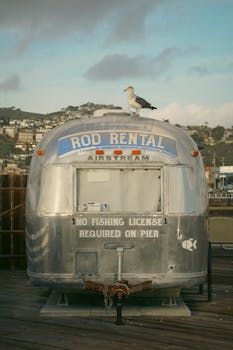 Airstream trailer for rod rental on Pier at Pismo Beach, California, with seagull.