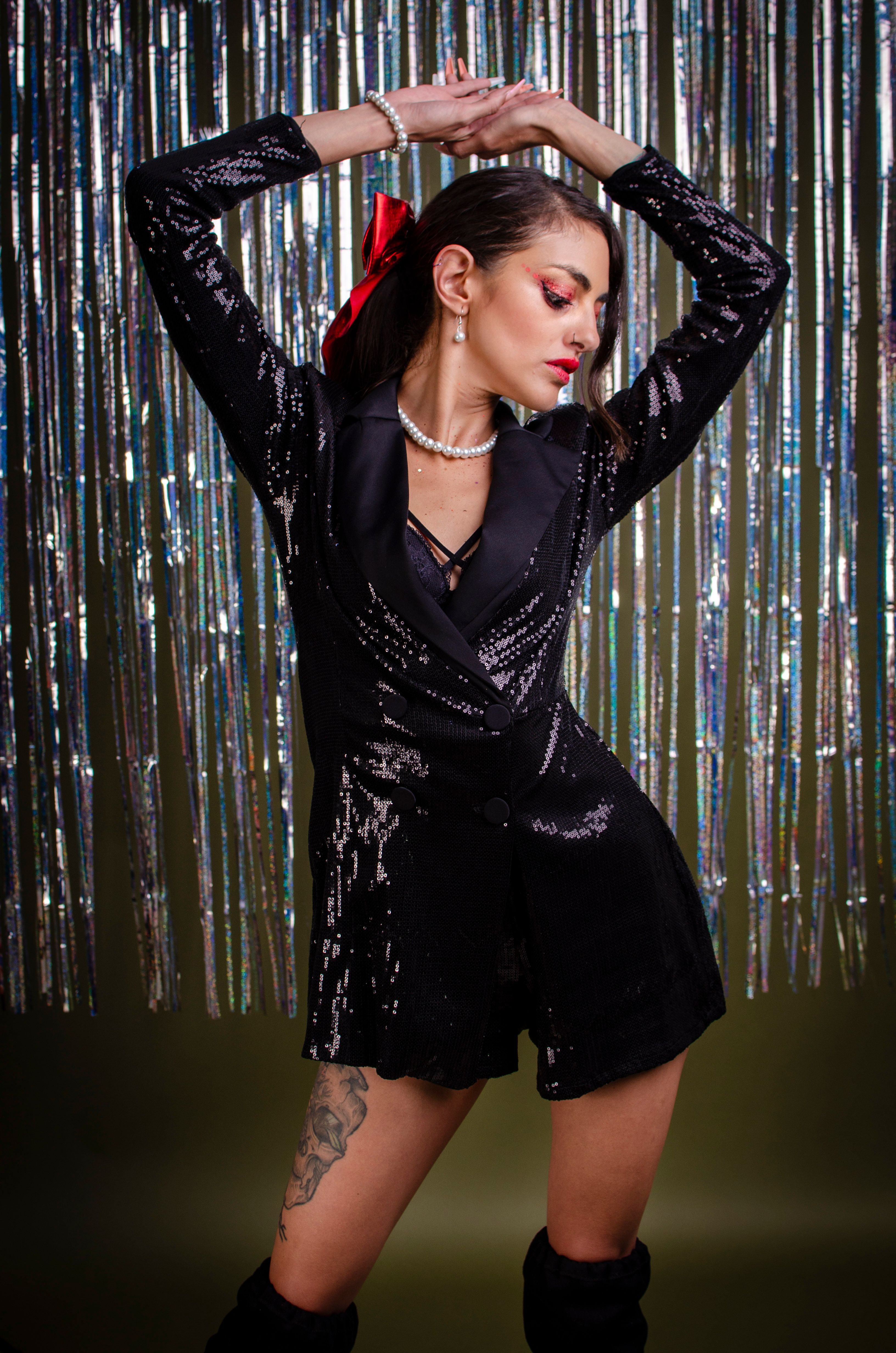 Black satin slip dress with sequin blazer