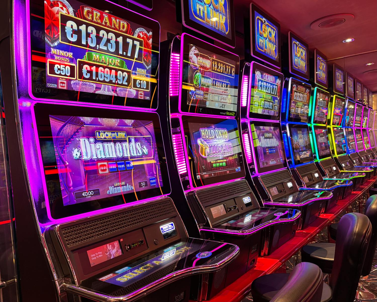 Colorful slot machines with jackpot displays