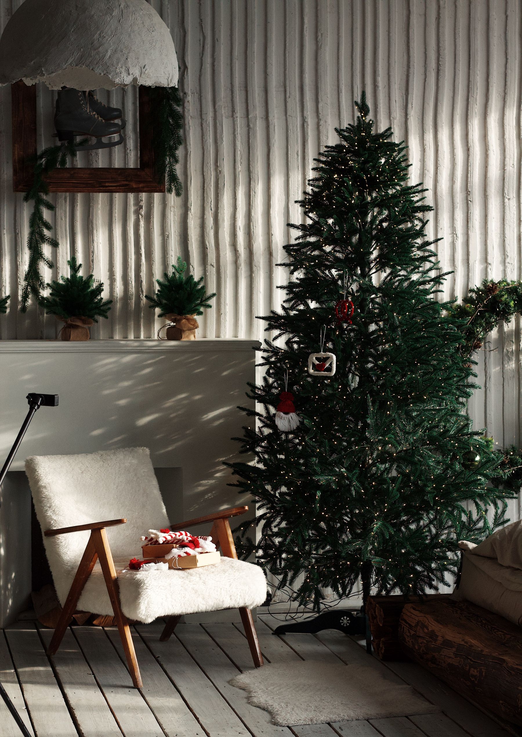 Small living area with tree and gifts