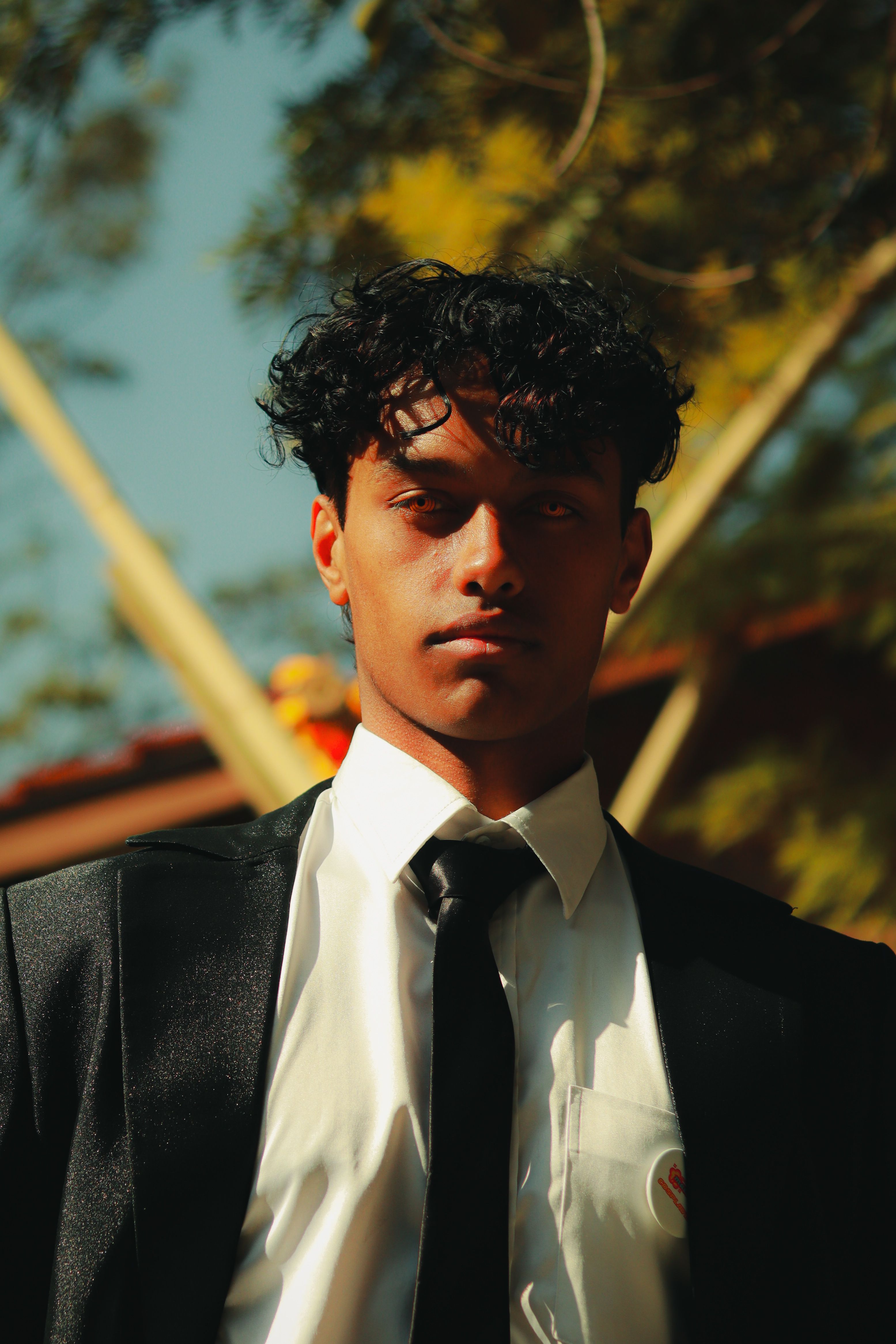 Young Man in Formal Attire Outdoors · Free Stock Photo
