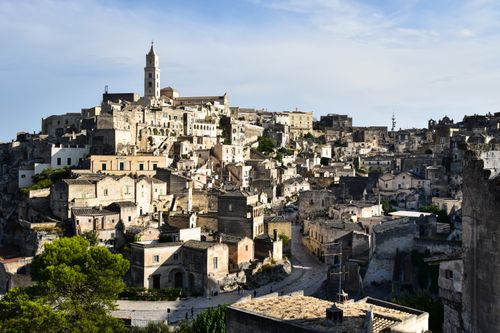 Free A picturesque view of Matera's ancient architecture bathed in daylight. Stock Photo