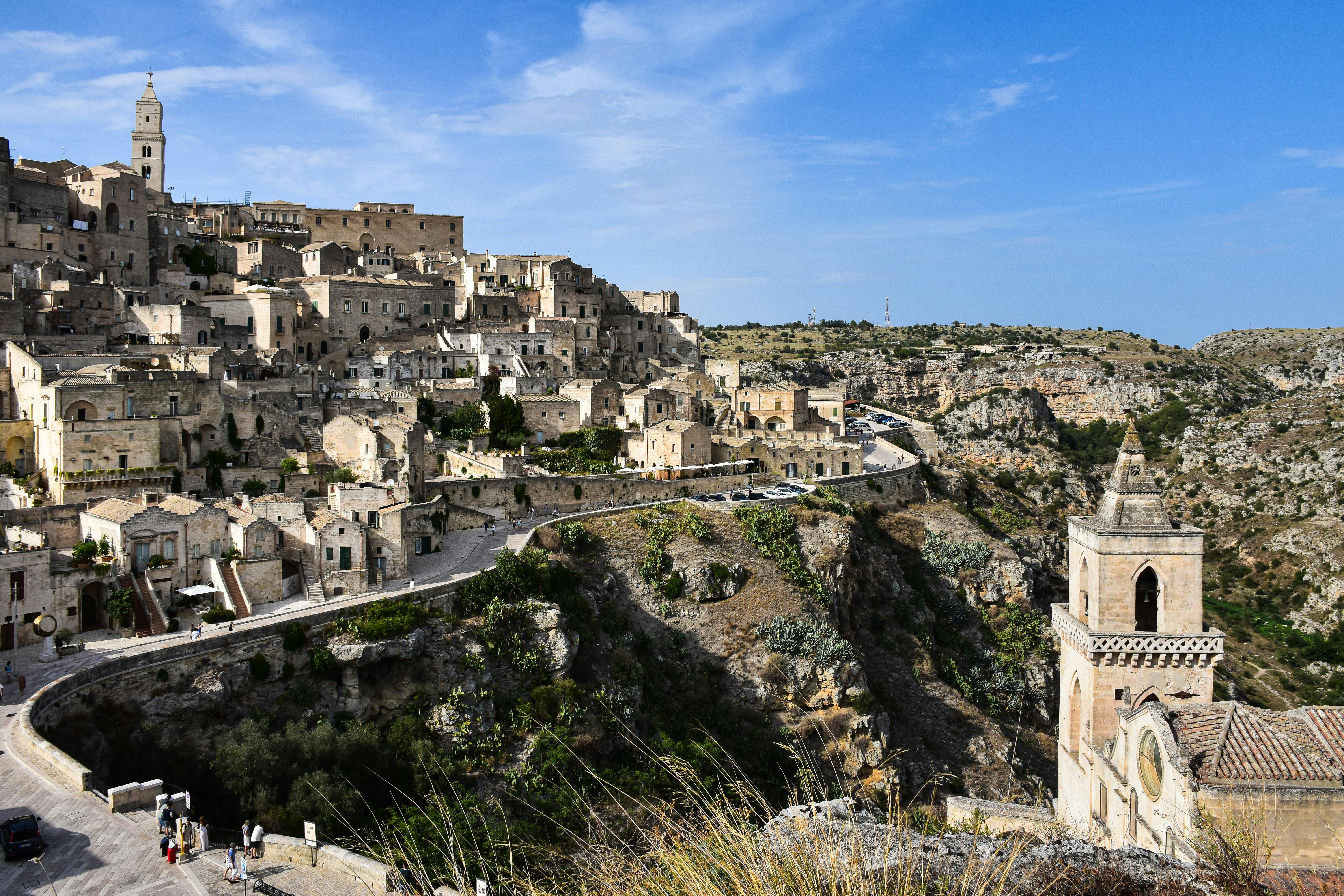 Explore the ancient stone buildings of Matera, Italy, showcasing breathtaking architecture.