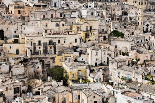 Free Explore the captivating ancient architecture and stone homes in Matera, Italy's picturesque landscape. Stock Photo