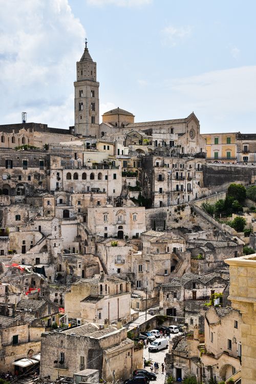 Free Discover the ancient architecture of Matera, Italy, showcasing stunning historical buildings under a bright sky. Stock Photo