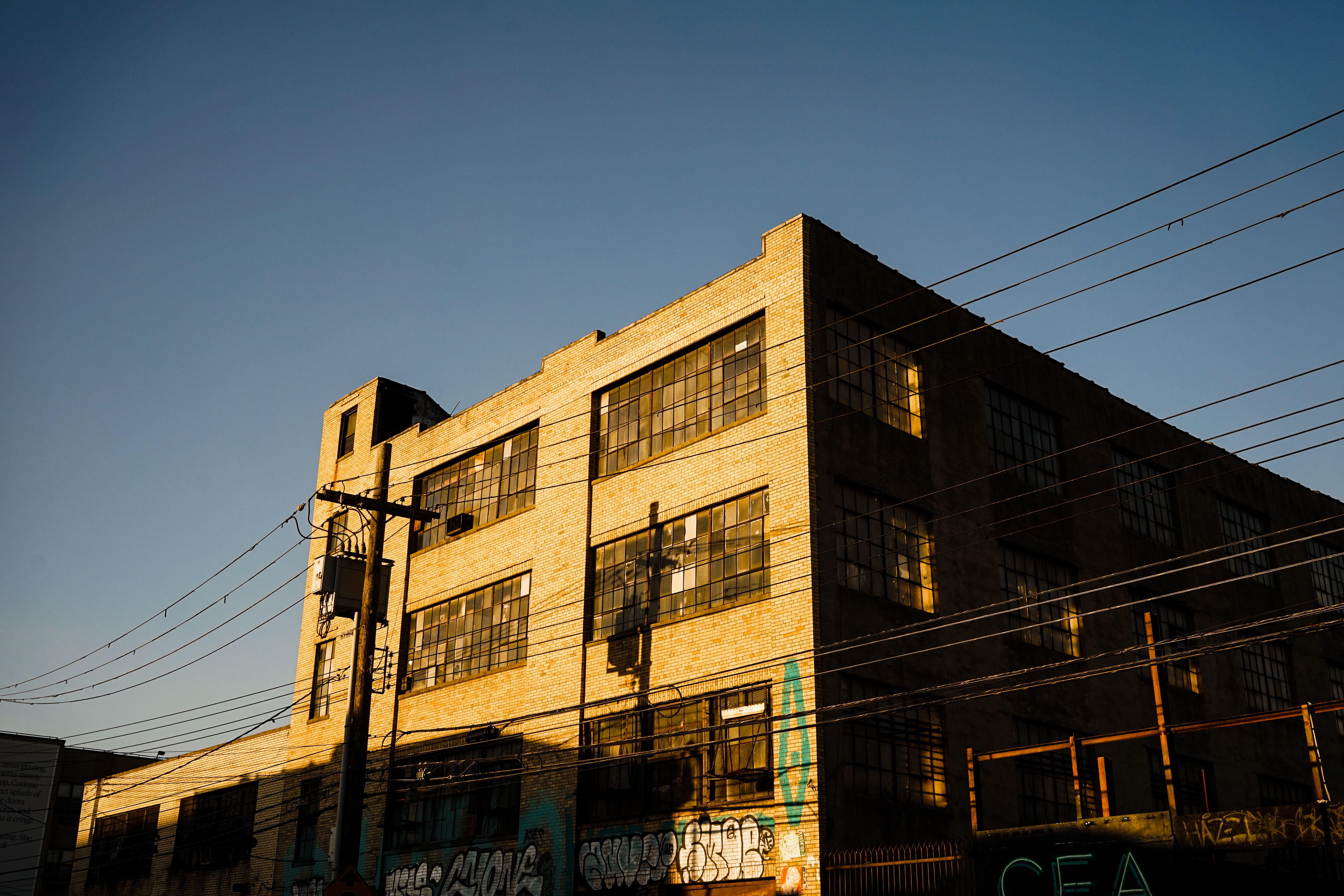 Urban Industrial Building in Golden Hour Light · Free Stock Photo - Urban Industrial Home Builders