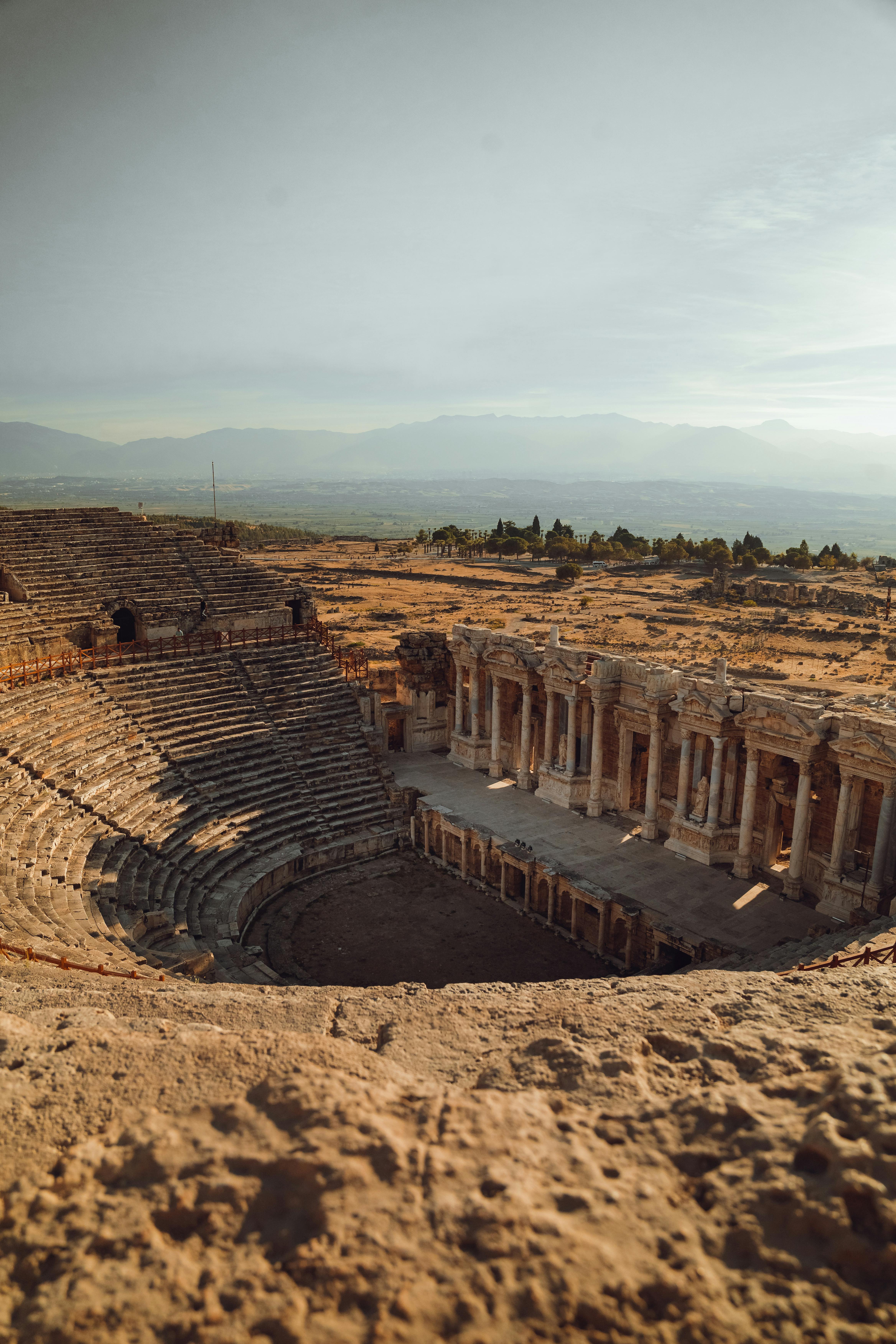 Free Explore the ancient Roman amphitheater at Hierapolis, showcasing stunning architecture and history. Stock Photo