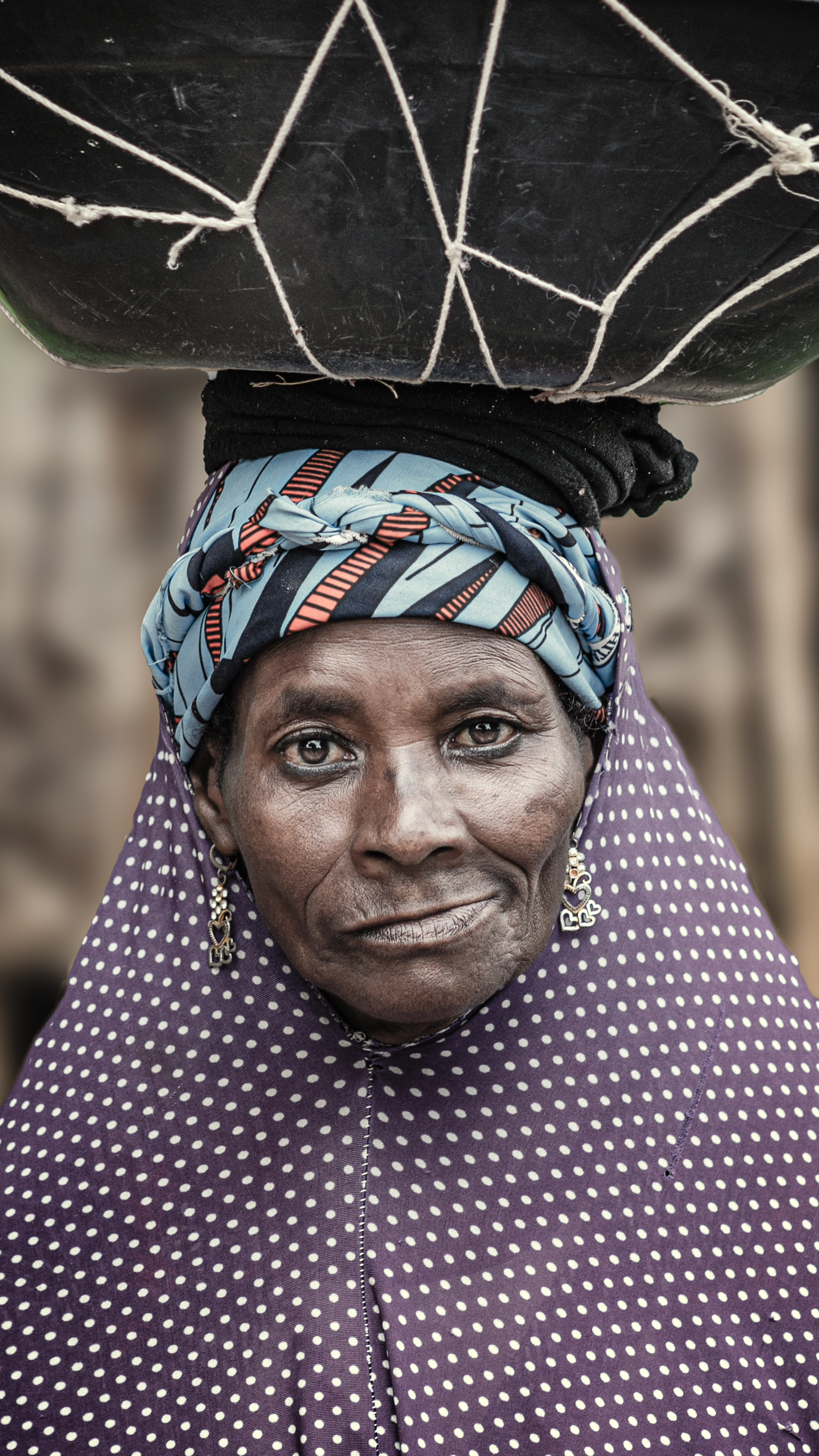 Portrait of a Woman with Traditional Headscarf · Free Stock Photo
