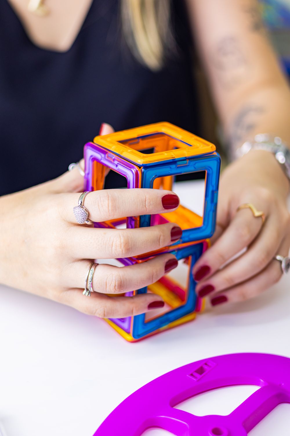 Colorful Magnetic Tiles in Playful Hands · Free Stock Photo