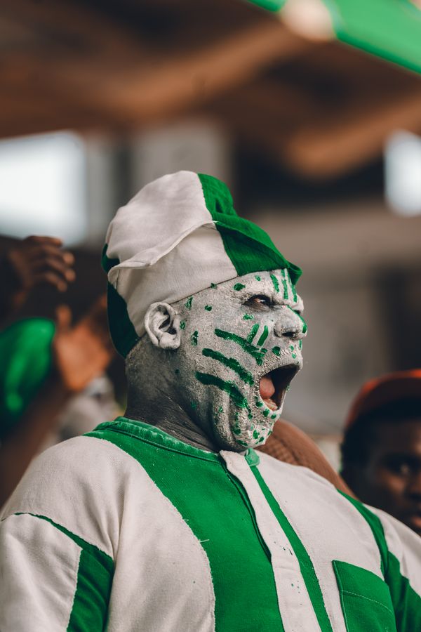 Face-paint and flags on match day