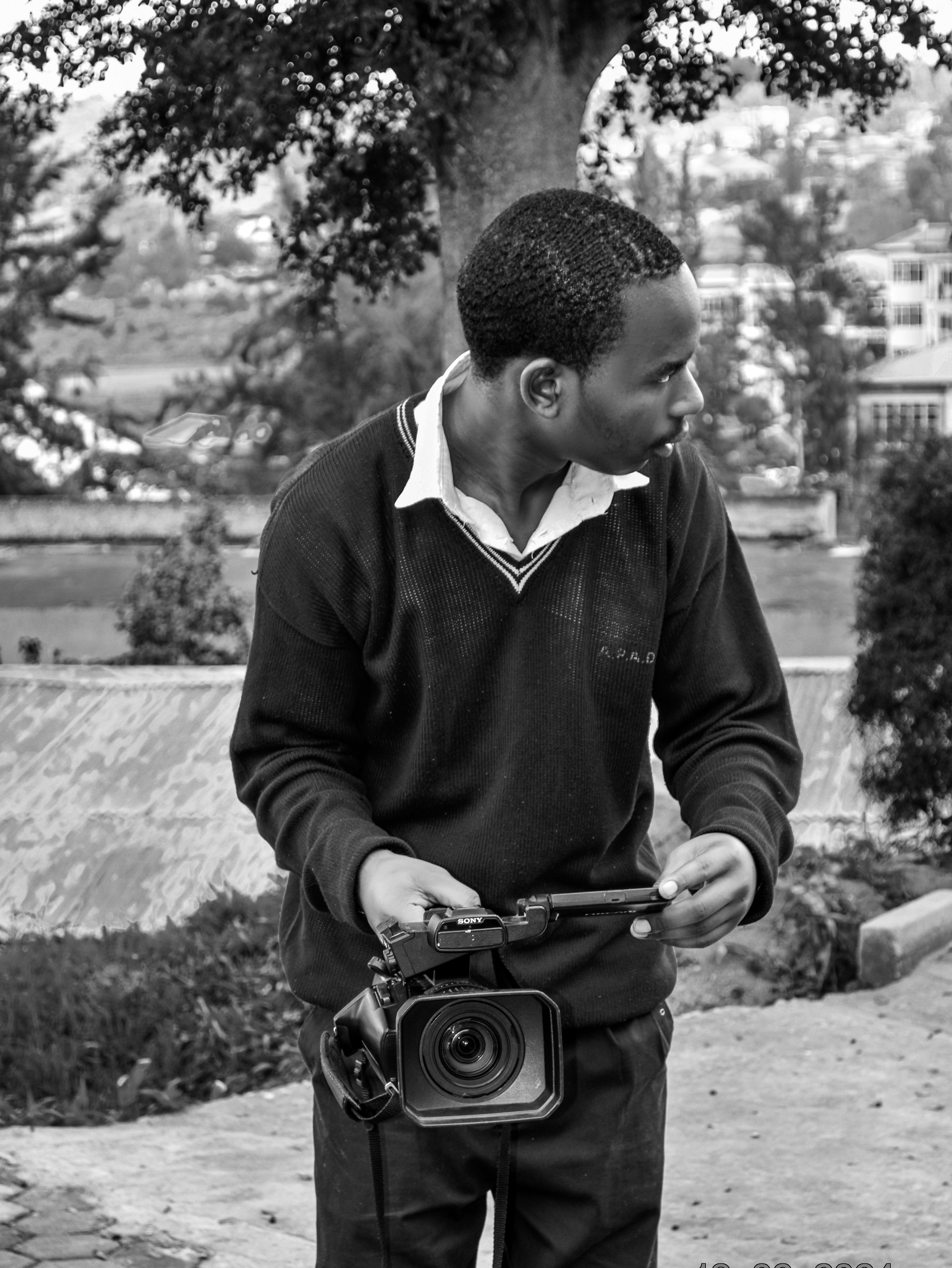 Black and White Portrait of Photographer in Kigali · Free Stock Photo