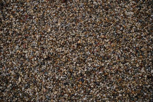 Free High-resolution image of assorted colorful pebbles creating a natural textured background. Stock Photo