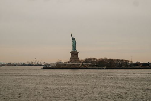 Free Distant view of the Statue of Liberty on Liberty Island in New York City. Stock Photo