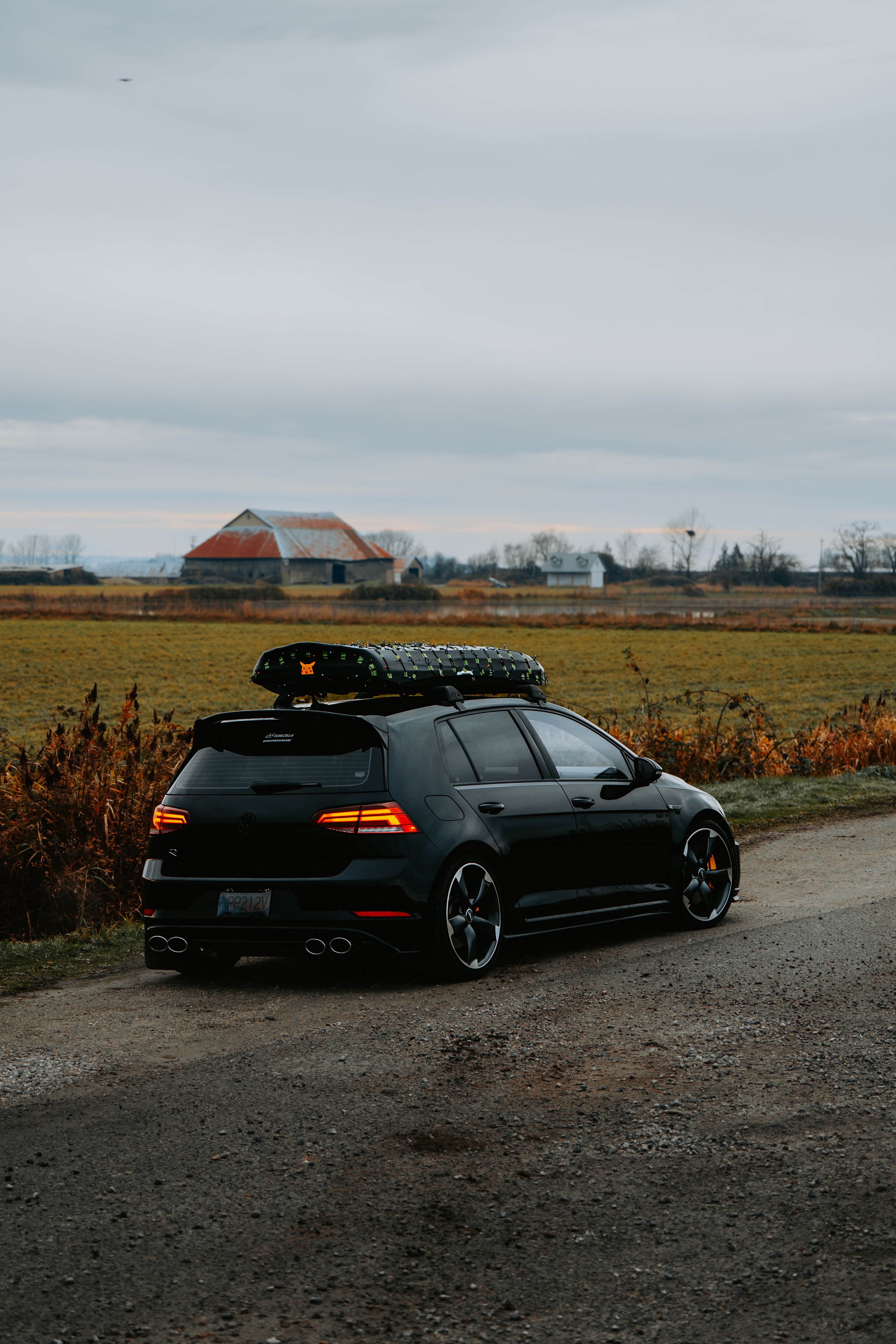 Stylish Car in Rural Countryside Setting · Free Stock Photo