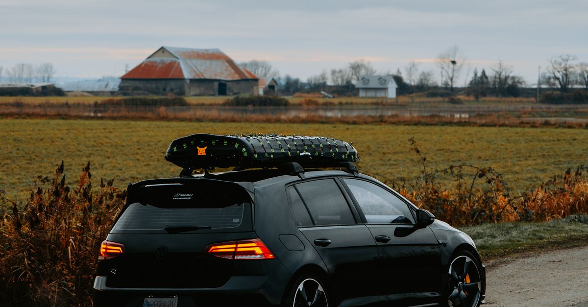 Car In Rural Setting Stylish Car in Rural Countryside Setting · Free Stock Photo