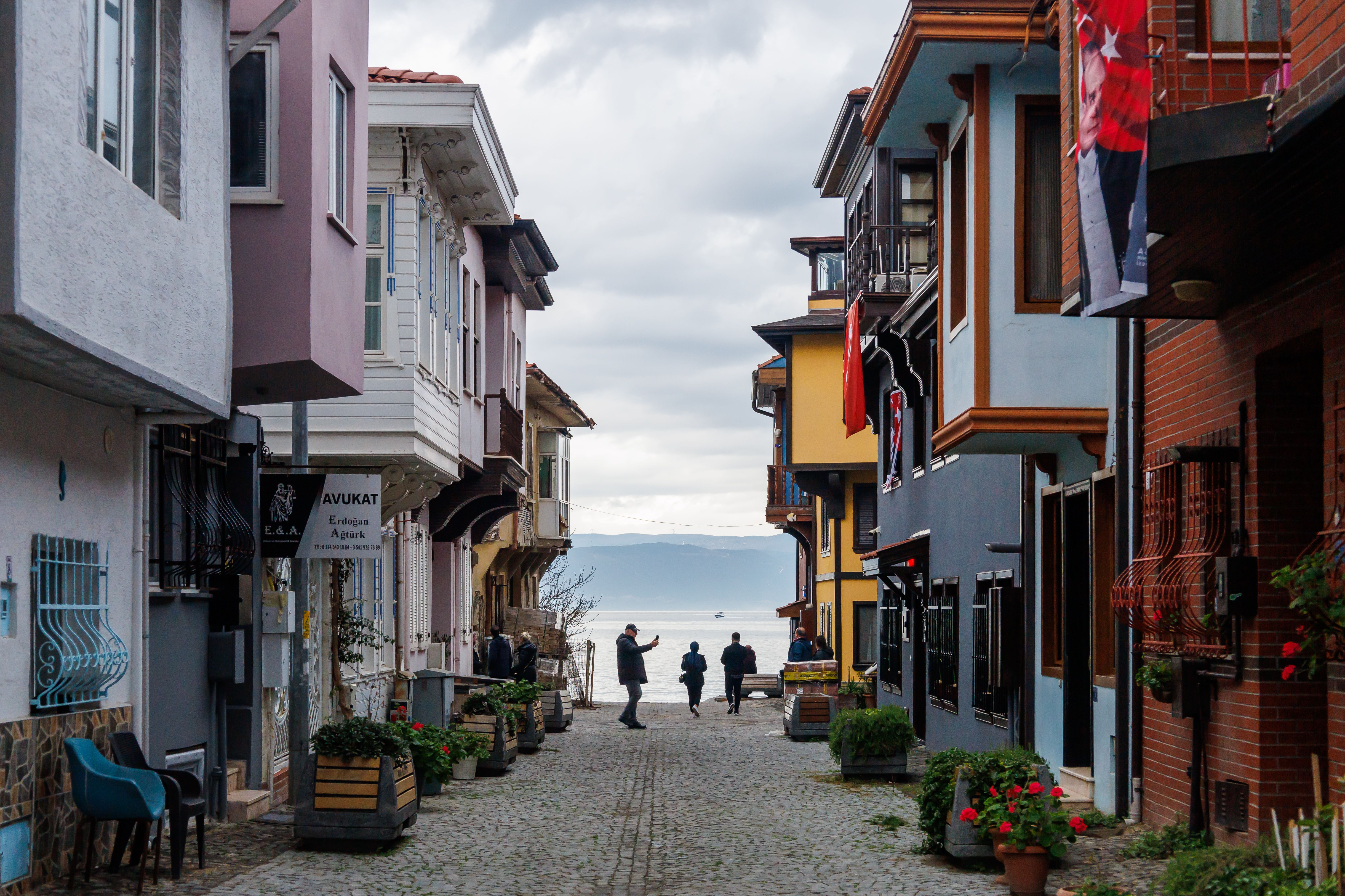 Charming European Street Leading to a Waterfront · Free Stock Photo