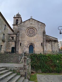 Stunning medieval stone church showcasing gothic architectural elements and historical charm.