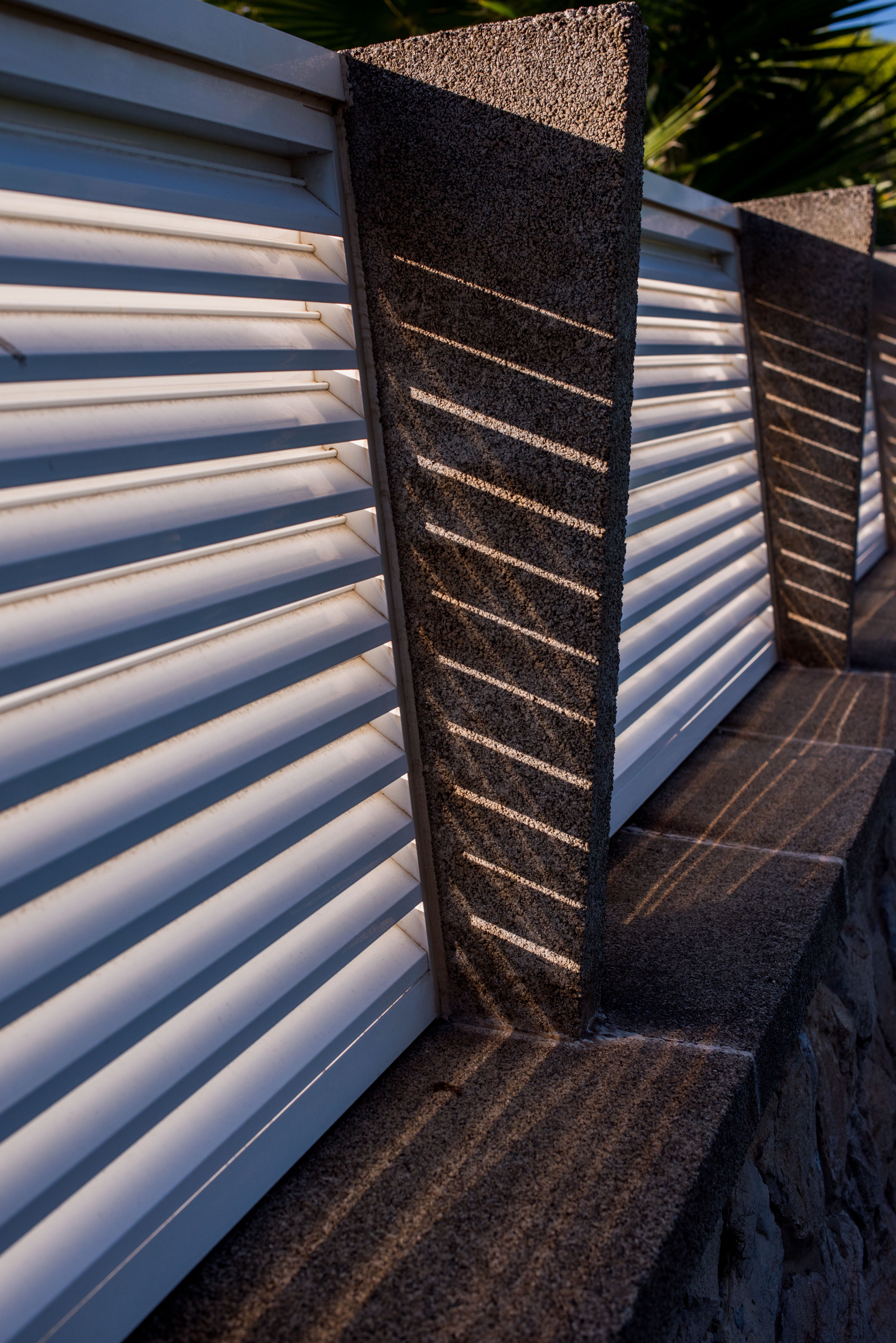 Geometric Patterns on Louvered Fence · Free Stock Photo