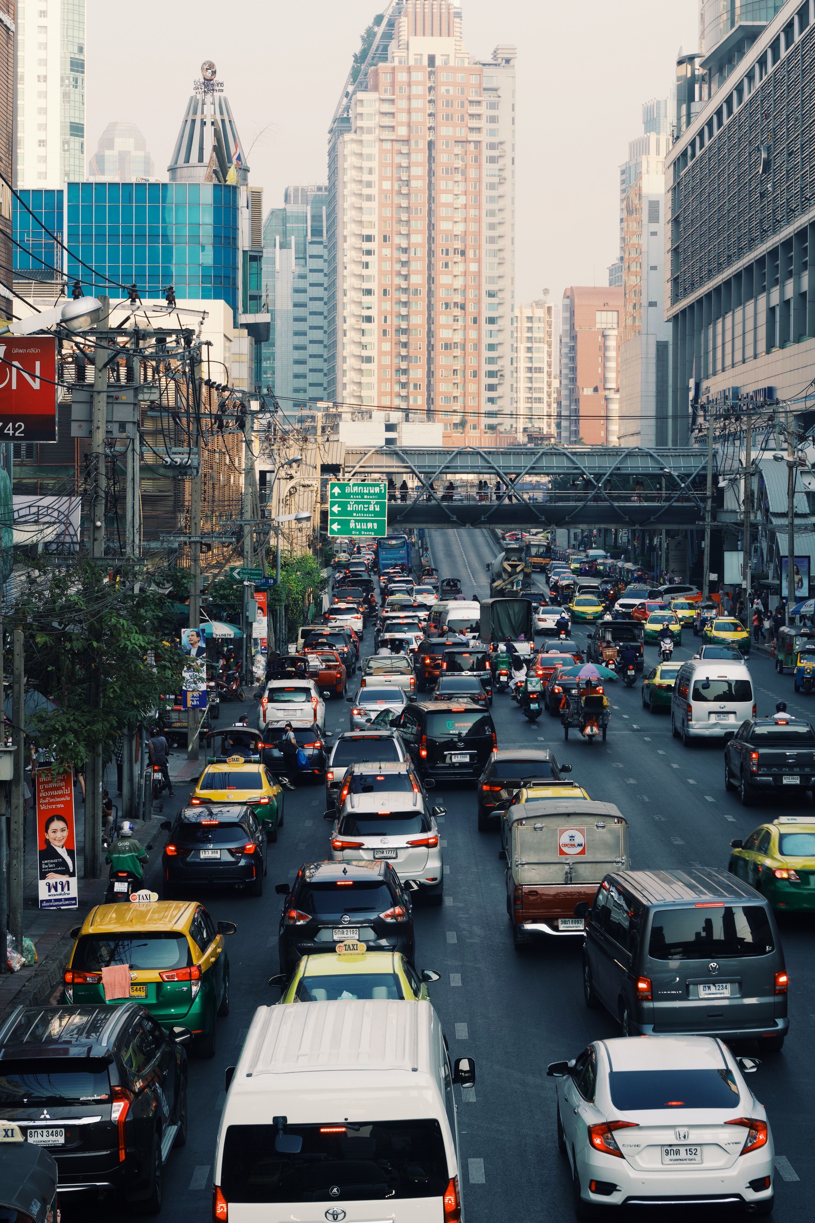 Busy Urban Street Traffic Scene with Skyscrapers · Free Stock Photo