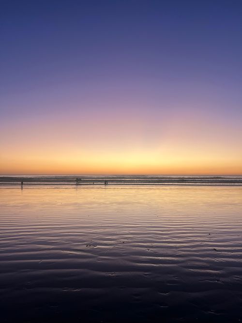 Free Breathtaking sunset over a serene beach in Costa Rica, capturing vivid sky colors. Stock Photo