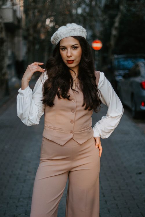 Free Stylish woman posing in fashionable outfit on Istanbul street, exuding modern elegance. Stock Photo