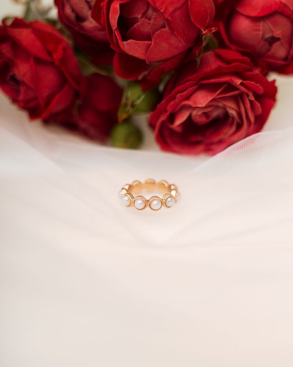 Red Roses Rng Elegant Gold Ring with Red Roses Background · Free Stock Photo