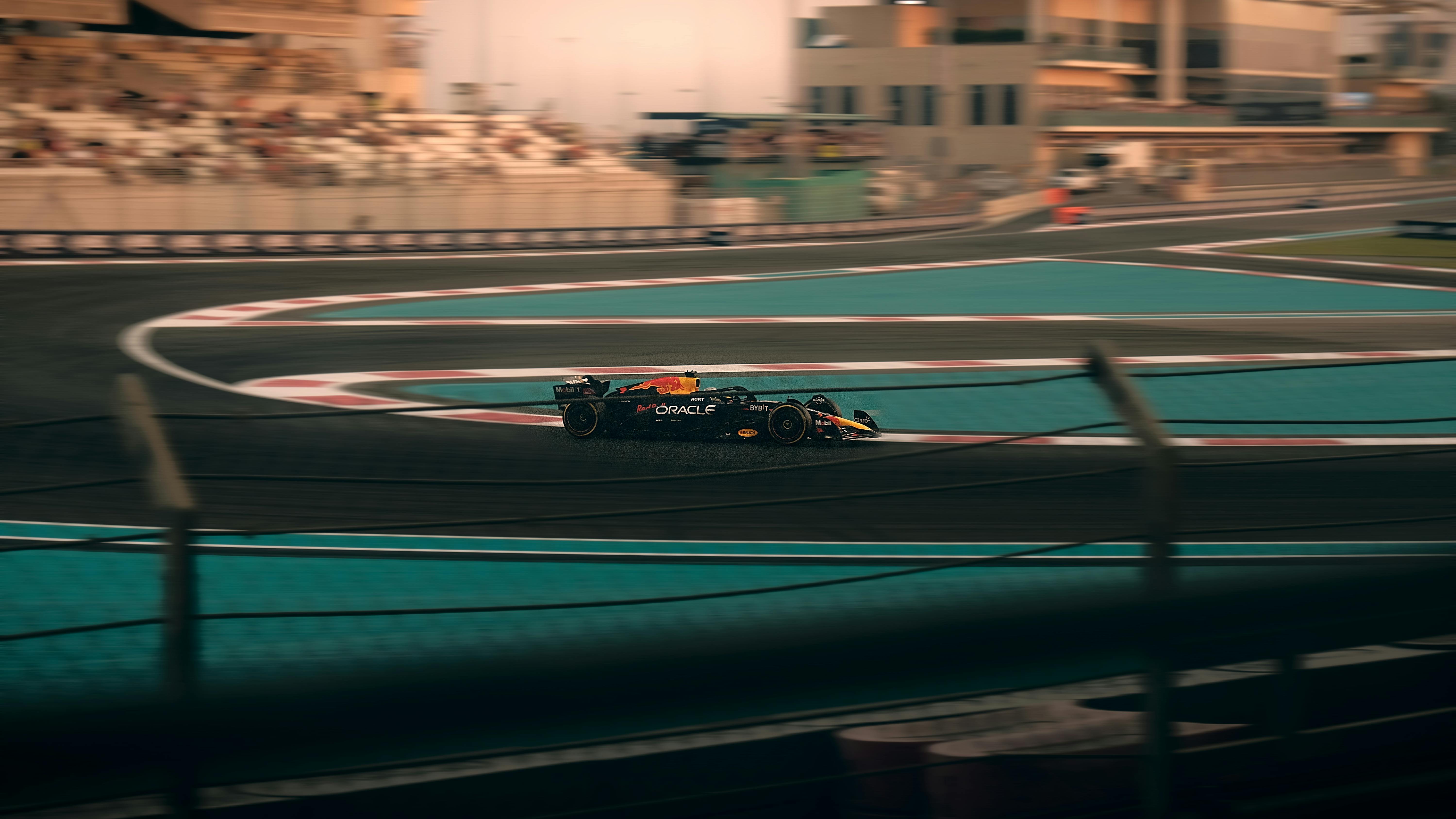 Exciting Formula 1 car racing on the Yas Marina Circuit, Abu Dhabi.