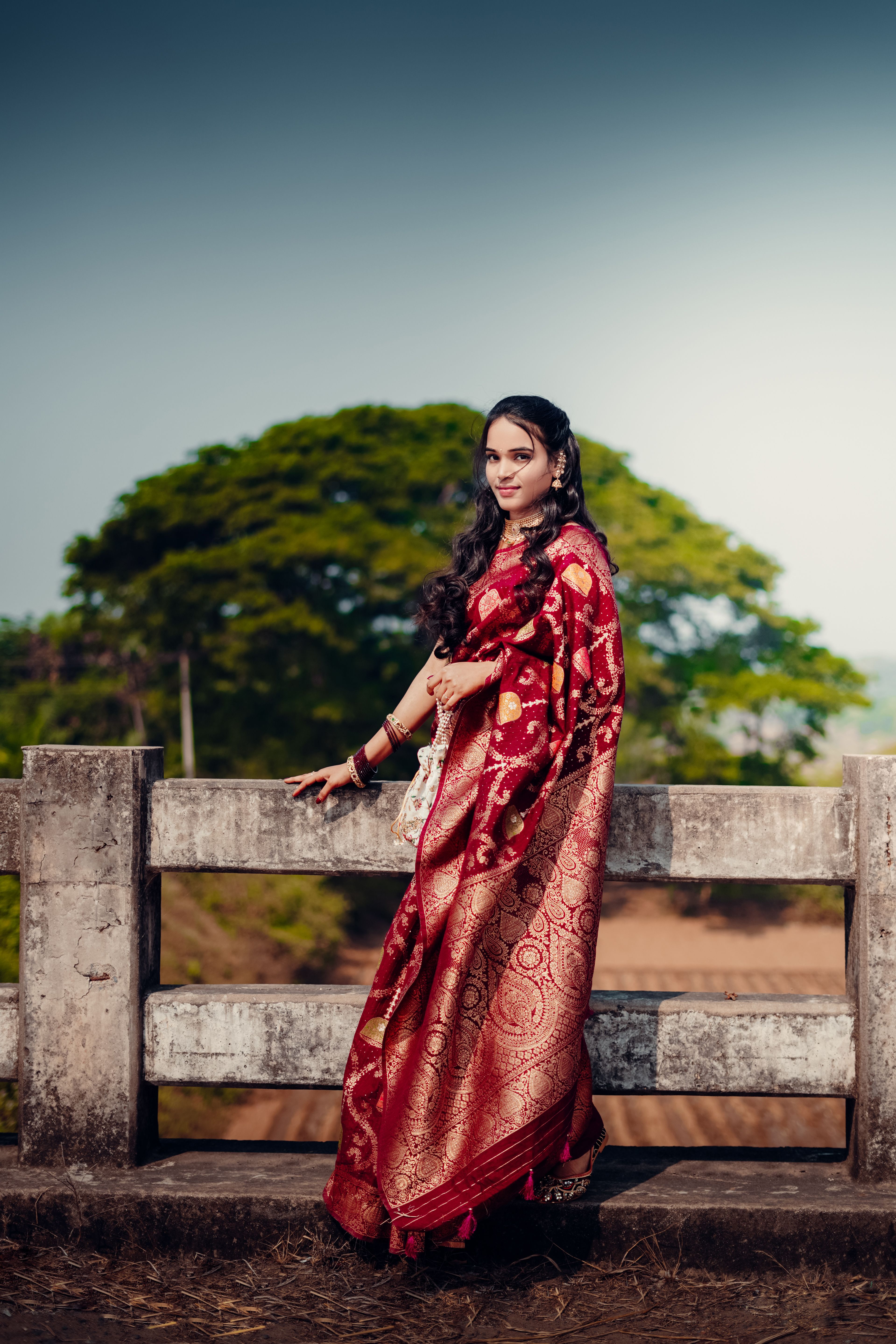 Elegant Woman in Traditional Indian Saree Outdoors · Free Stock Photo