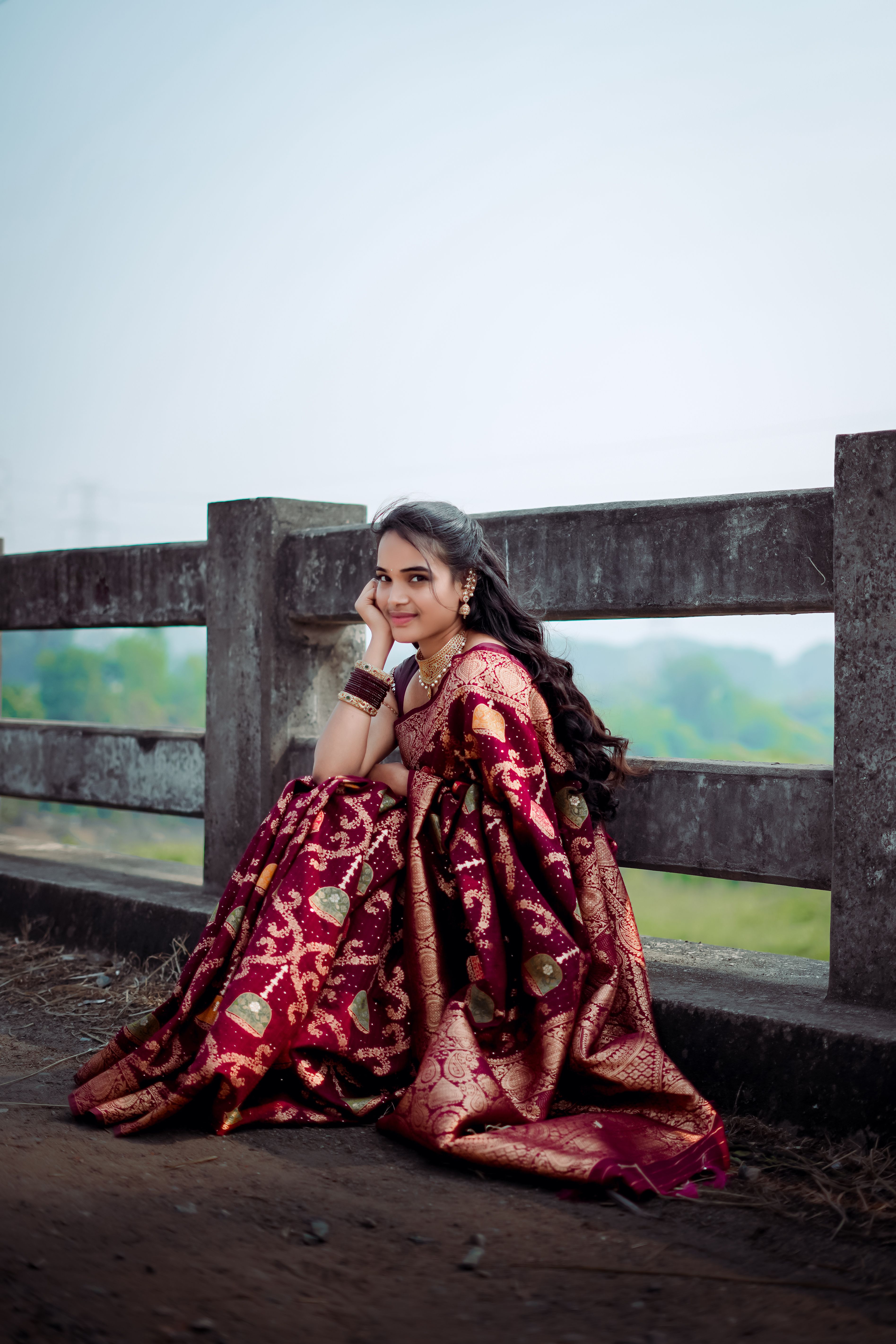 Elegant Woman in Traditional Indian Saree Outdoors · Free Stock Photo