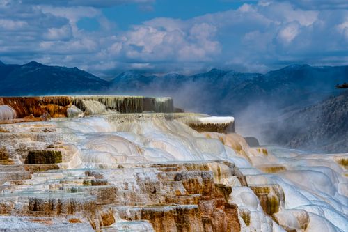 Free Stunning view of Mammoth Hot Springs terraces in Yellowstone National Park showcasing unique geothermal formations. Stock Photo