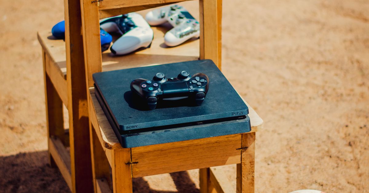 Rustic Outdoor Gaming Setup with Soccer Ball · Free Stock Photo